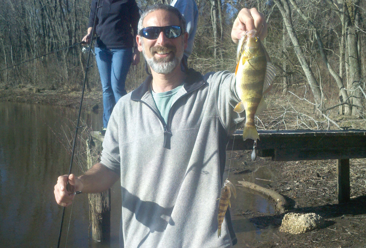 Lenny Kayak with a pair of yellow perch